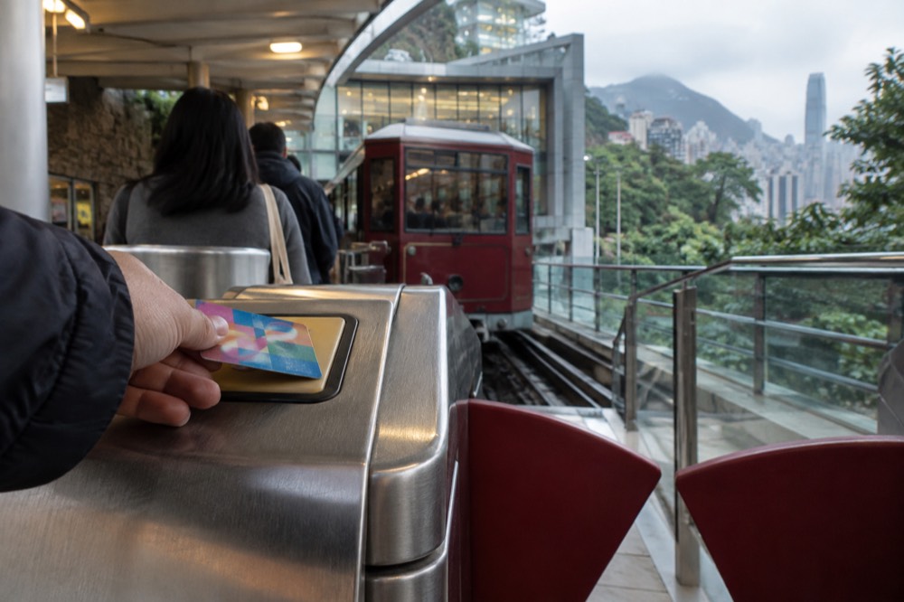 Octopus card reader on the fare gate of a Hong Kong public transport entrance