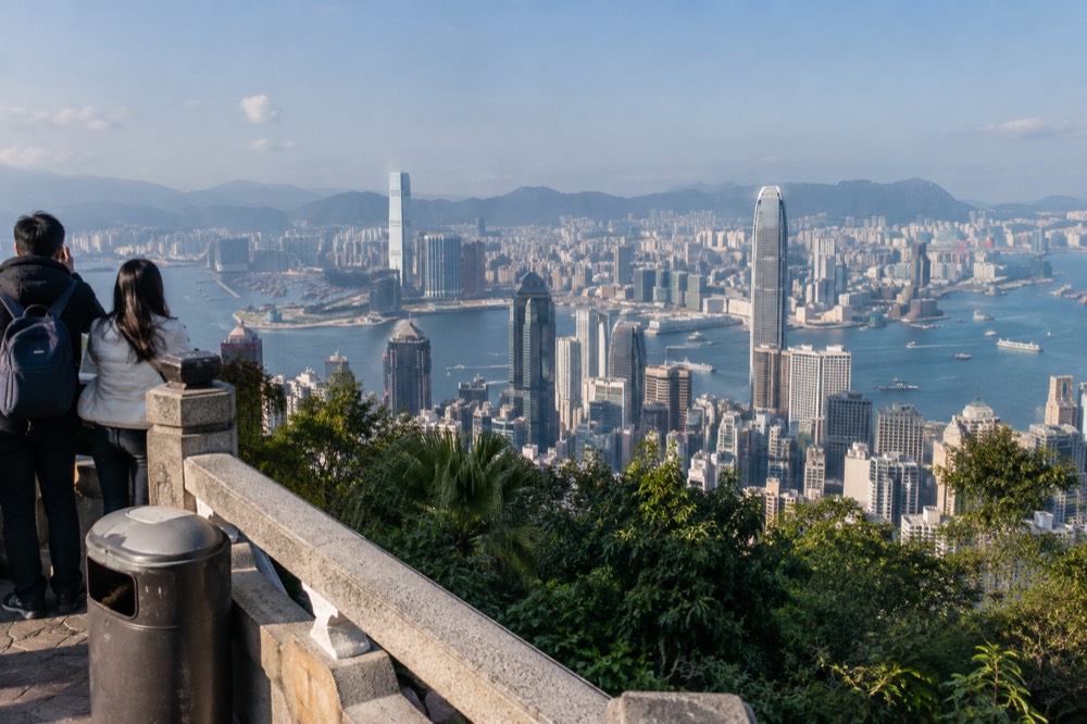 Panoramic view of Hong Kong skyline and Victoria Harbour from a free viewing point at the Peak