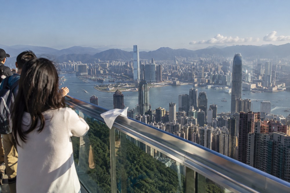 Panoramic harbour and skyline view from a high observation deck at the top of the hill