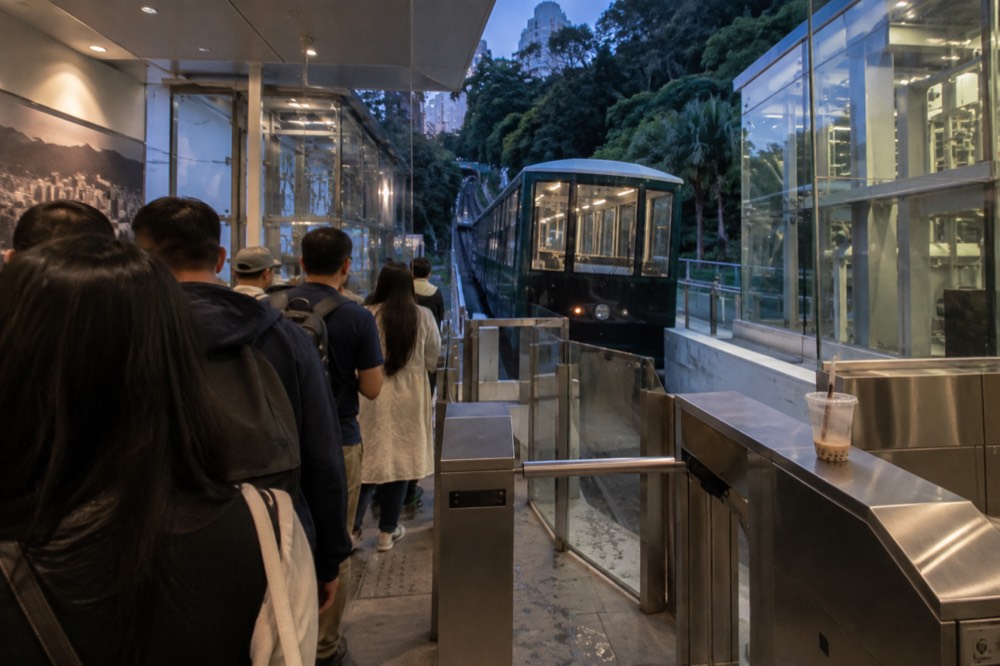 Ticket gates and boarding queue inside the rebuilt Peak Tram Central Terminus